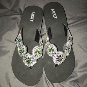NWT black wedge flip flops